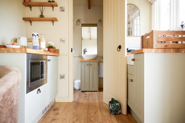 A view of the interior of The Tup Shepherds Hut at Great Ashley Farm in Bradford-on-Avon
